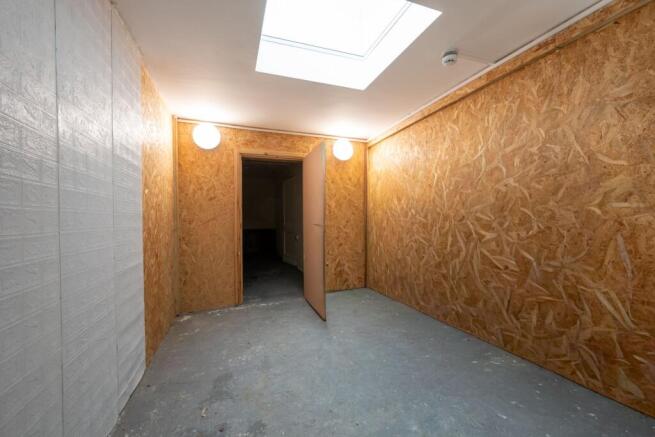Store Room 3 and entrance to first floor flat