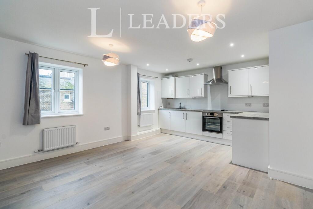 Main image of property: 93b Hersham Road, KT12