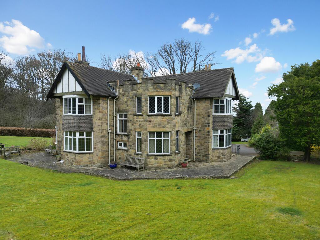 Main image of property: Large House  Outbuildings - Bramwood, 11 Creskeld Crescent, Bramhope, Leeds, LS16 9EH