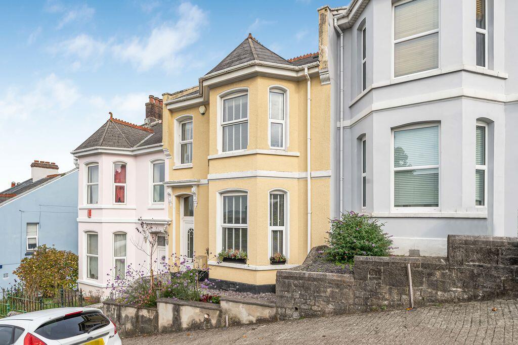 Main image of property: Fairfax Terrace, Stoke, Plymouth. A charming four-bedroom house with an abundance of character and a delightful garden.