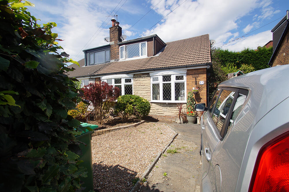 Main image of property: 51 Wellmeadow Lane, Uppermill, Ol3 6DU
