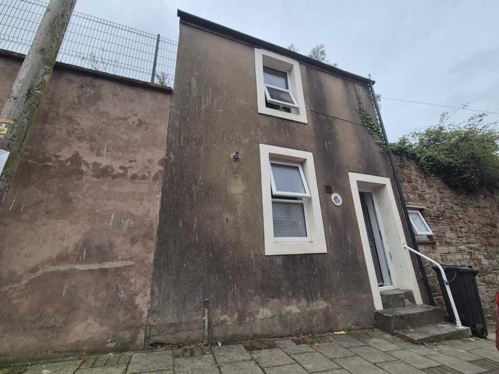 Main image of property: Gull Cottage, 1 George Street, Maryport, Cumbria CA15 6DT