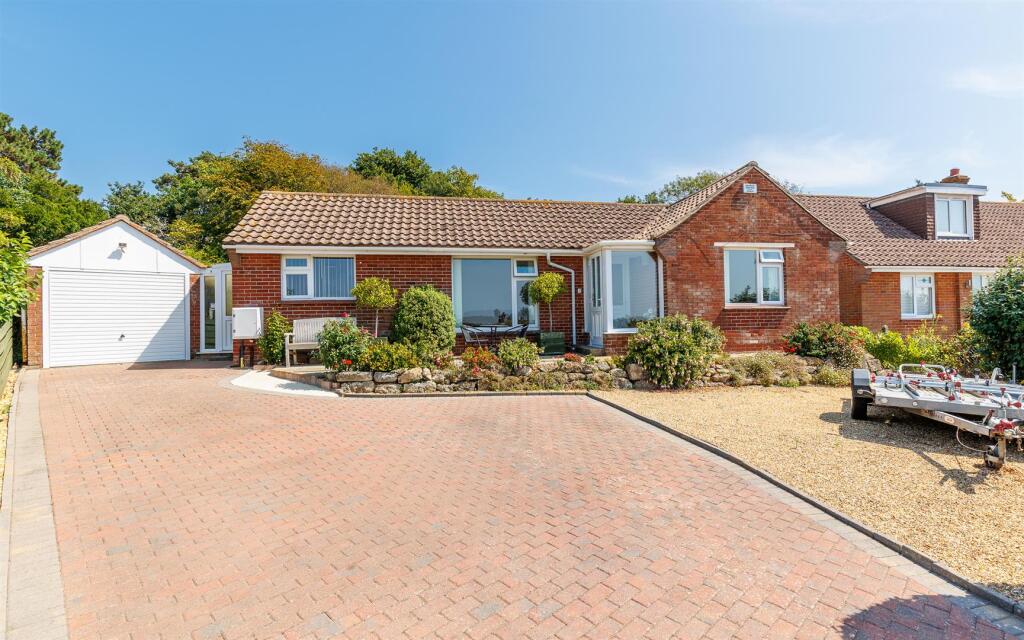 Main image of property: BUNGALOW WITH SEA VIEWS - Woodvale Close, Cowes