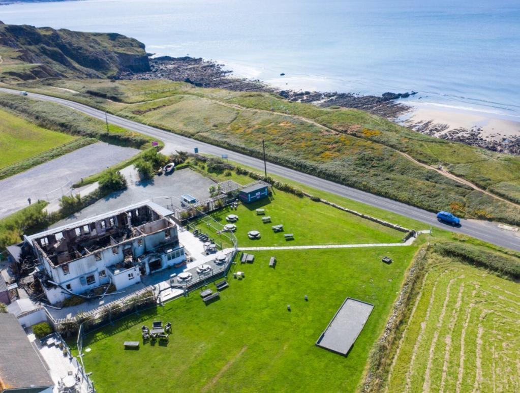 Main image of property: Former Elements Hotel, Marine Drive, Widemouth Bay, Bude, Cornwall, EX23 0LZ
