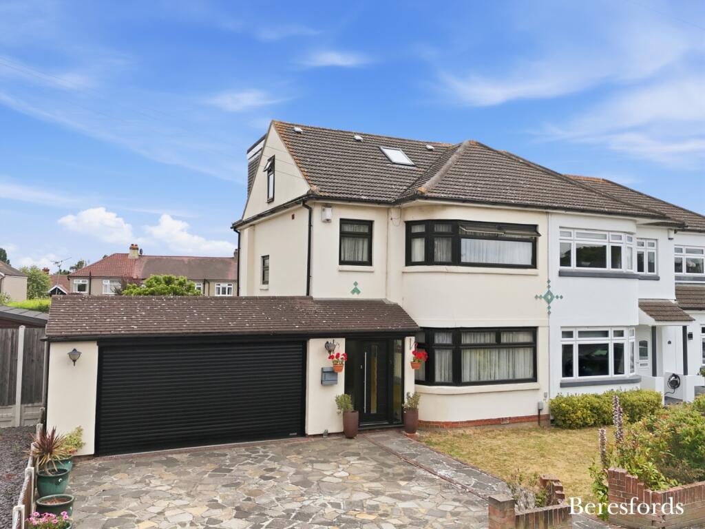 Main image of property: Elmhurst Drive, Hornchurch, RM11