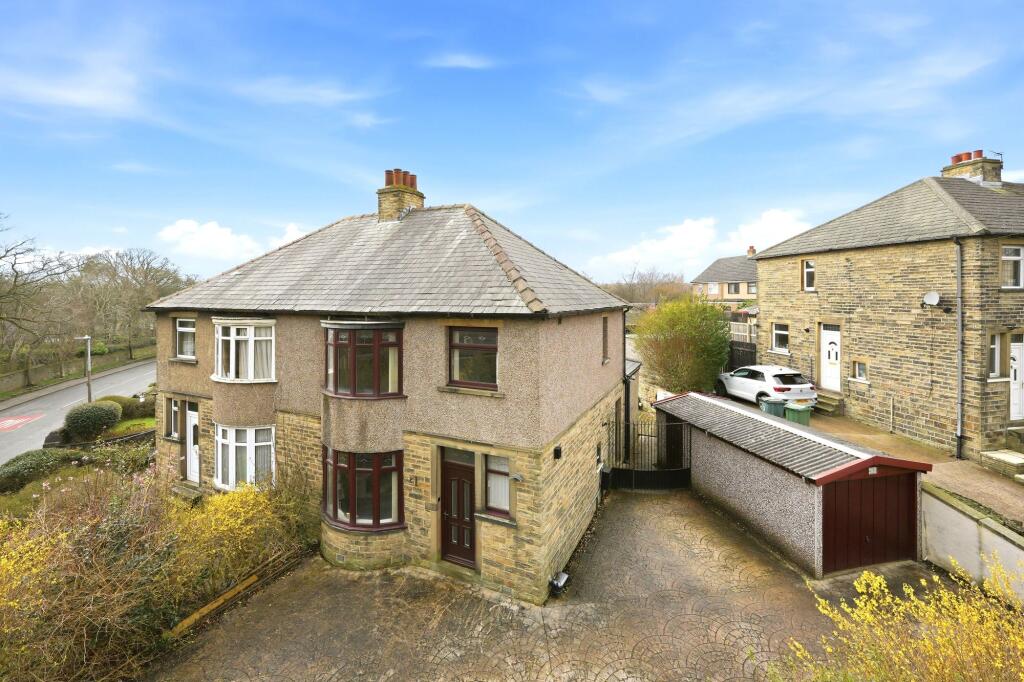 Main image of property: Reinwood Avenue, Huddersfield, HD3