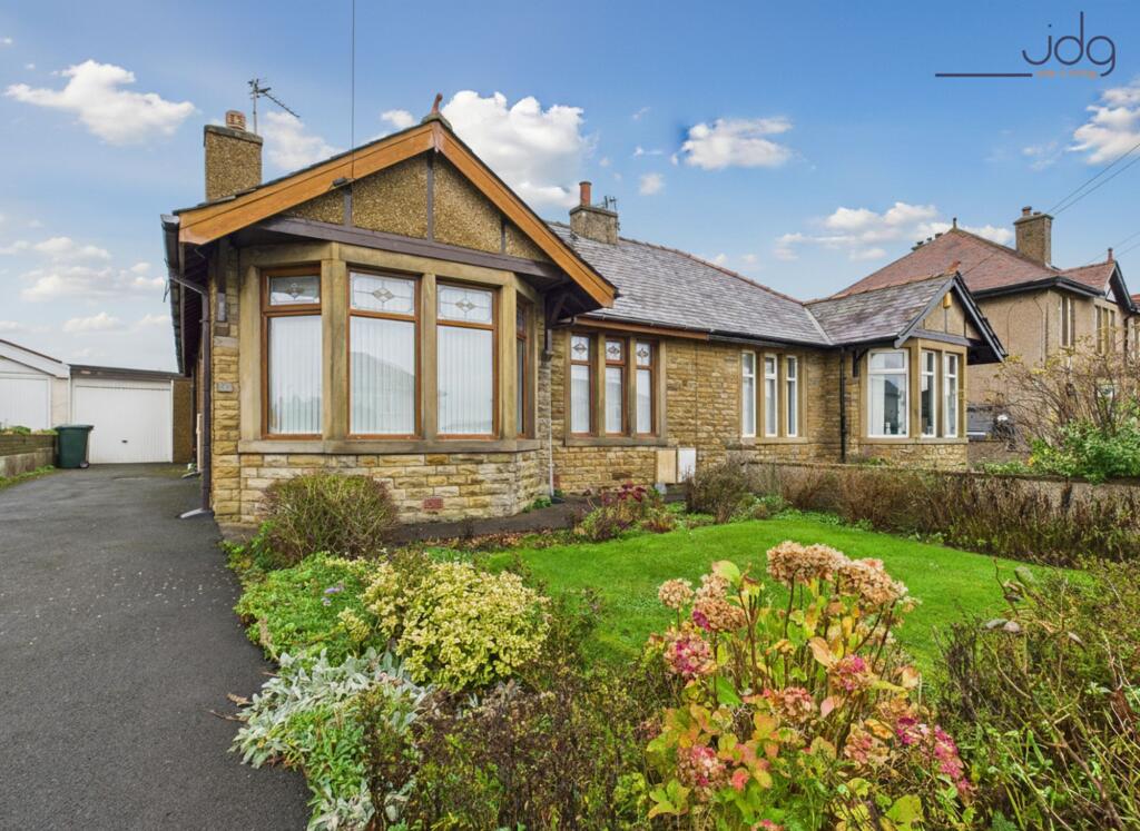 Main image of property: Twemlow Parade, Heysham | Spacious bungalow on a great plot just moments from the seafront