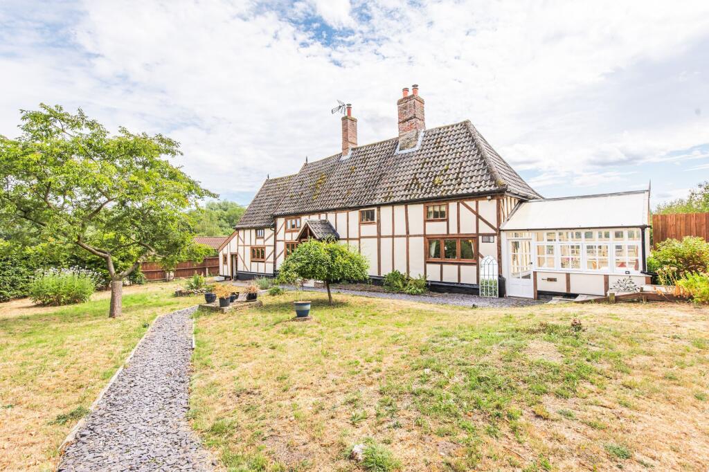 Main image of property: Enchanting Period Cottage in Merton