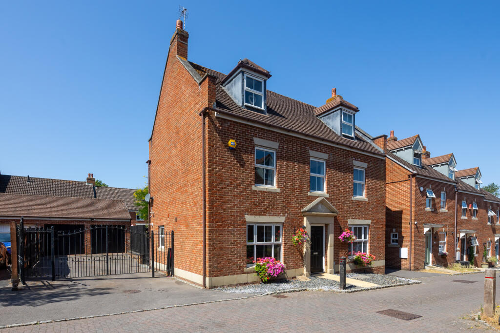 Main image of property: Kingfisher Grove, RG7