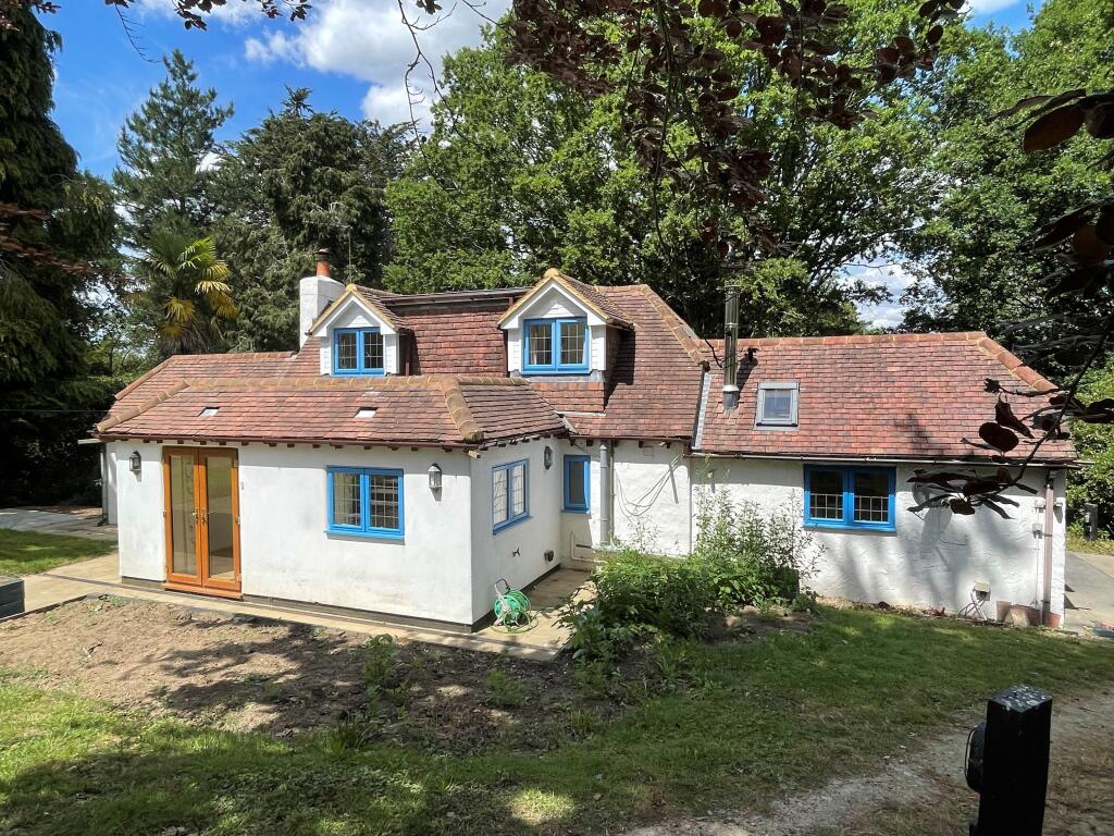 Main image of property: Inglenook Cottage, Knowle Lane, Cranleigh, Surrey