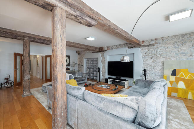 Exposed Stone Walls &amp; Original Warehouse Beams