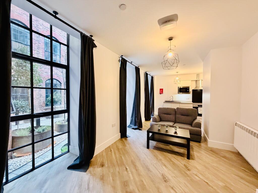 Main image of property: Duplex Apartment, Woolpack Mills