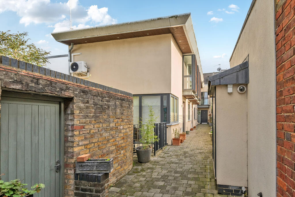Main image of property: Elmgrove Mews, Weybridge, KT13