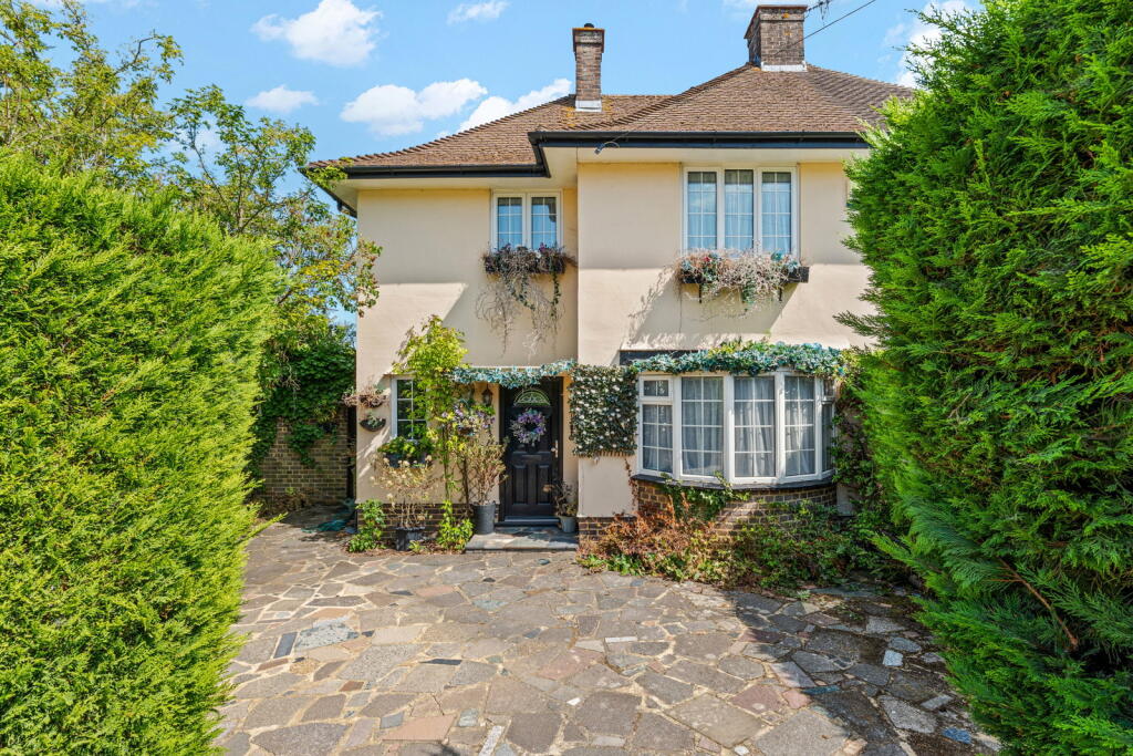 Main image of property: Downland Close, Epsom, Surrey, KT18 5SQ