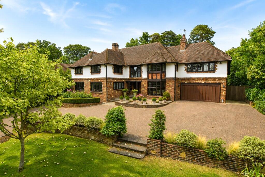 Main image of property: Woodland Drive, East Horsley, KT24
