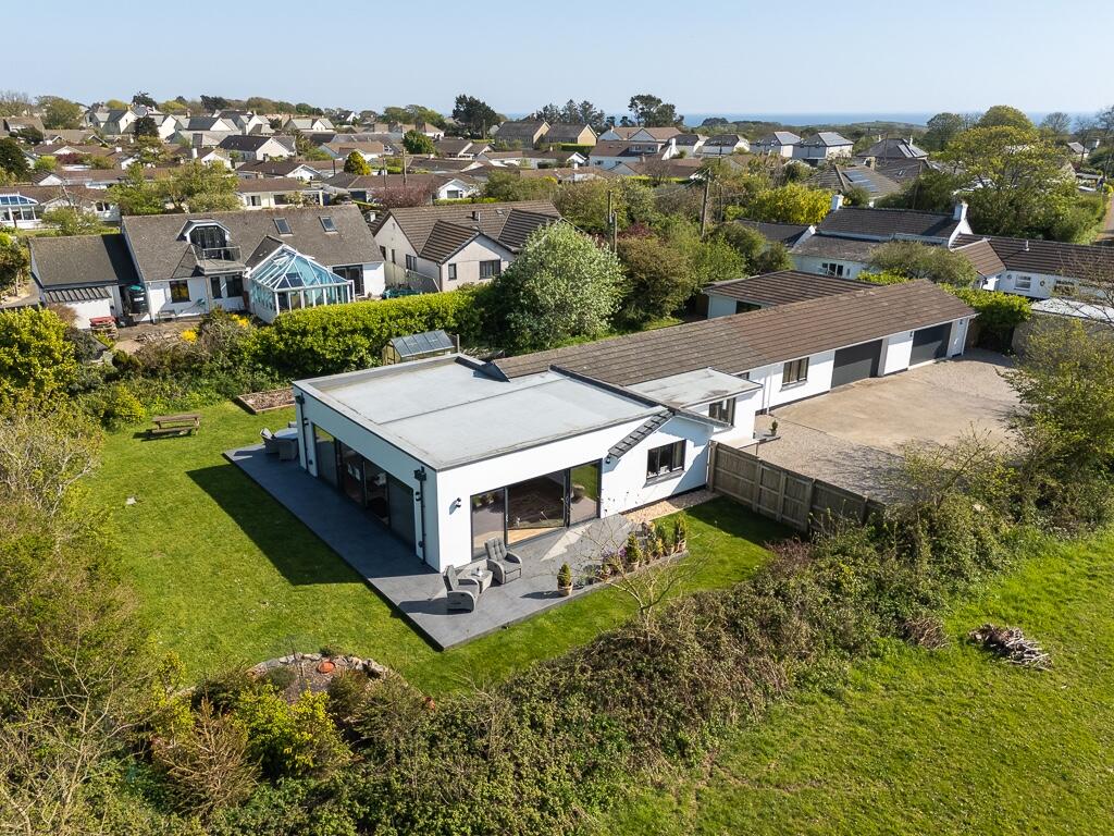 Main image of property: Field End - Lancamshire Lane - Incredible fully renovated 4 bedroom bungalow in large private grounds.  