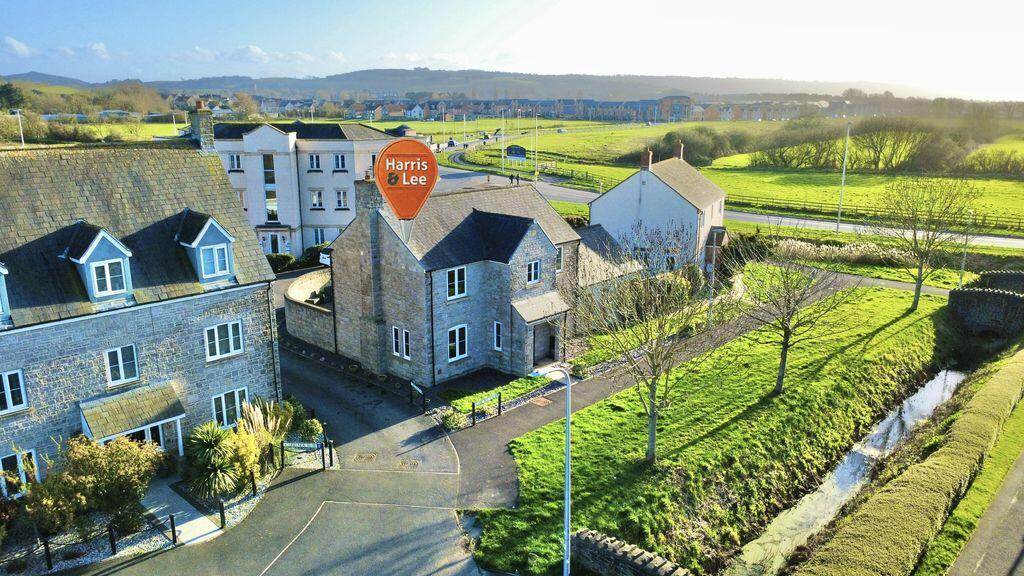 Main image of property: Turnock Gardens, West Wick - SUPER SETTING