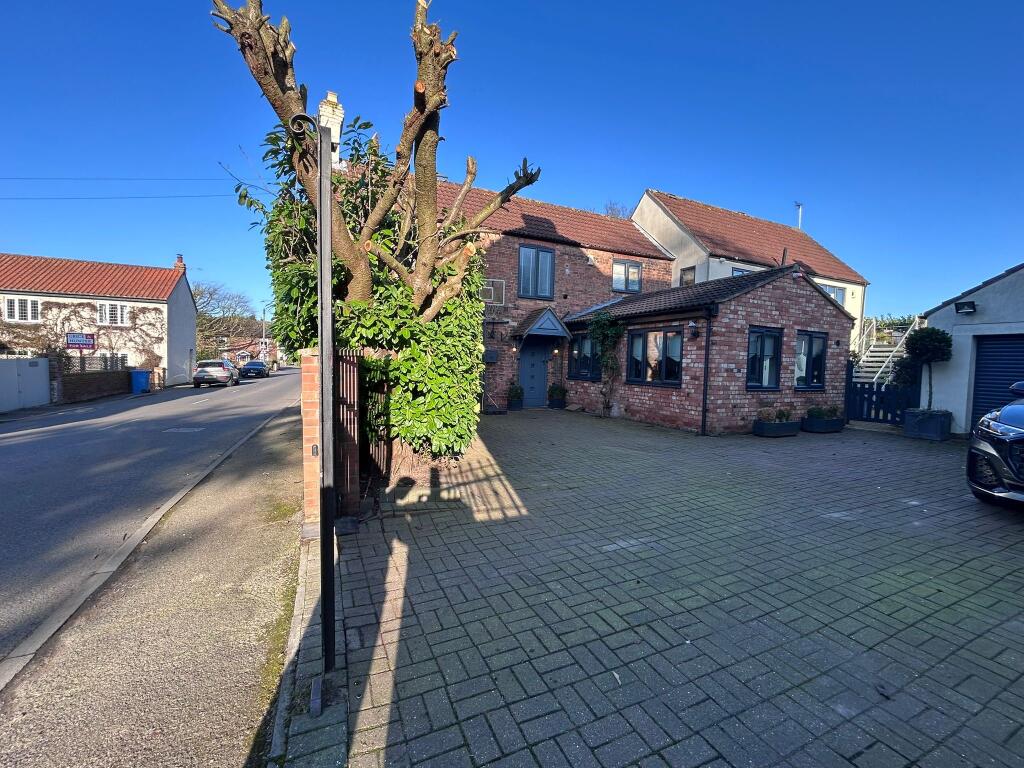 Main image of property: River Cottage, Main Street, West Stockwith, Doncaster, South Yorkshire DN10 4HB