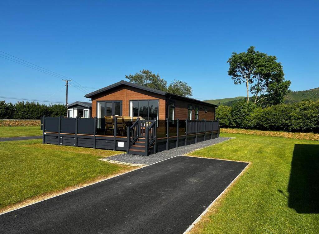 Main image of property: Prestige Plantation House Lodge(40ft x 20ft) 2021, Maesmawr Farm Resort