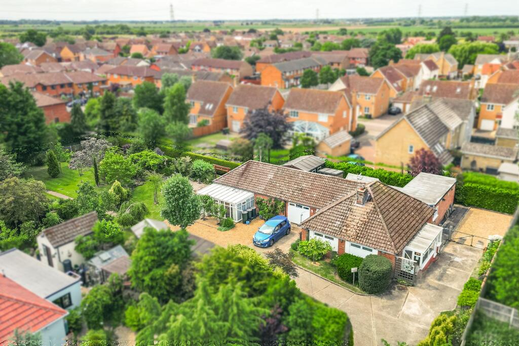 Main image of property: West Winch Setting with Almost Half an Acre