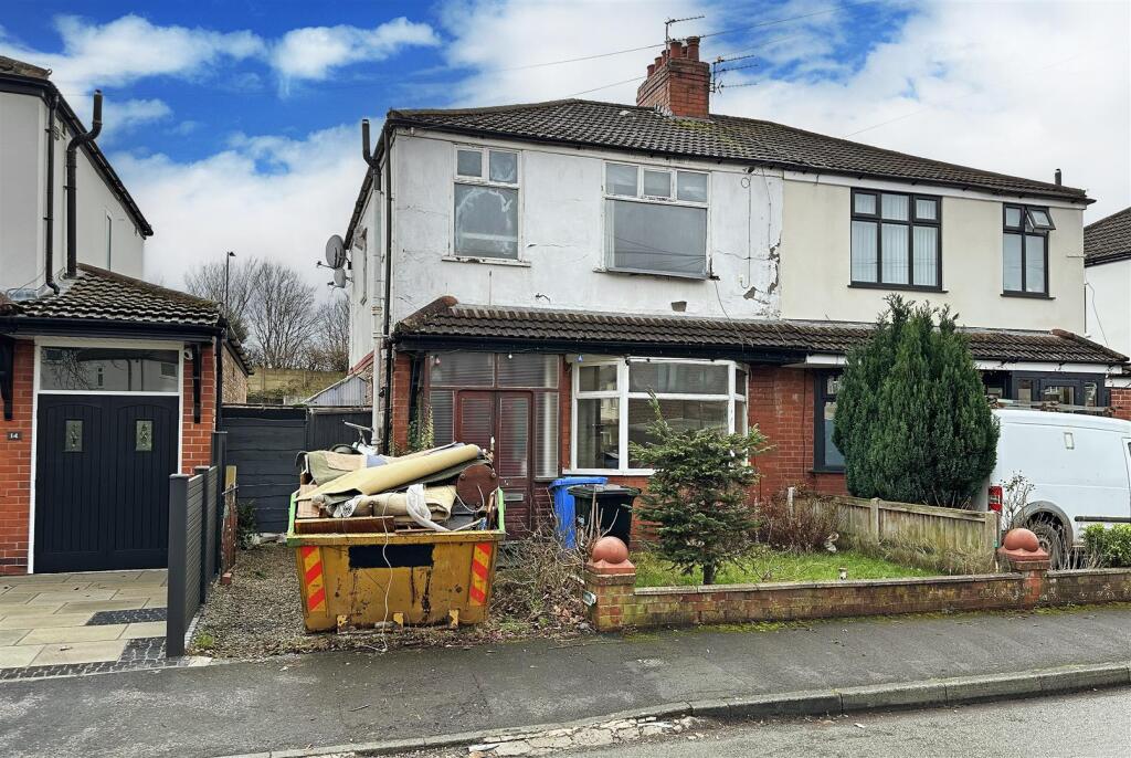 Main image of property: 12 The Triangle, Timperley