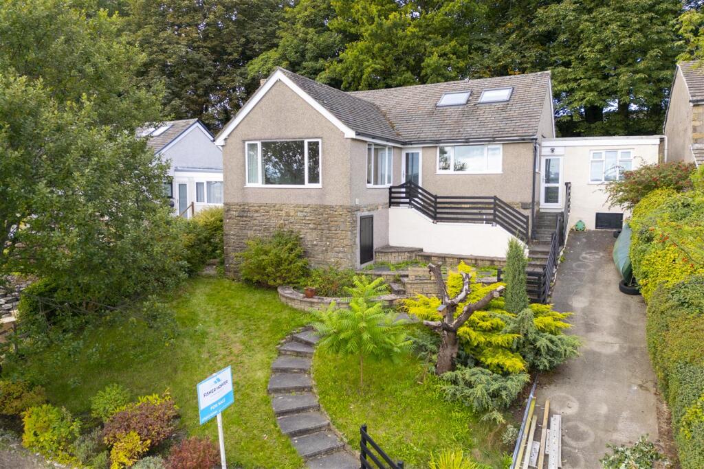 Main image of property: 14 Ingleborough Park Drive, Ingleton