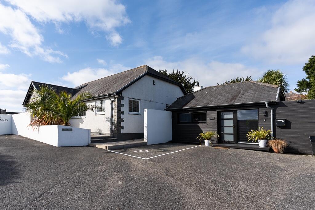 Main image of property: Heather Lane - Stunning 4 Bedroom Home with Detached Annexe