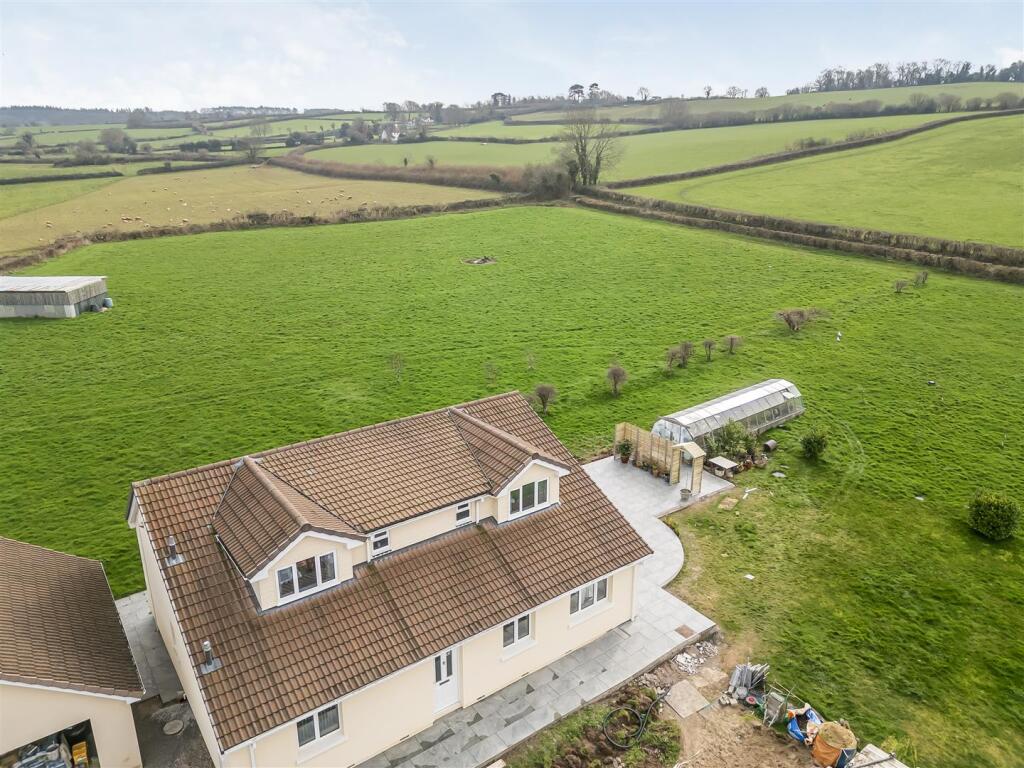 Main image of property: Stunning detached eco family home with 3 acres of land & double garage