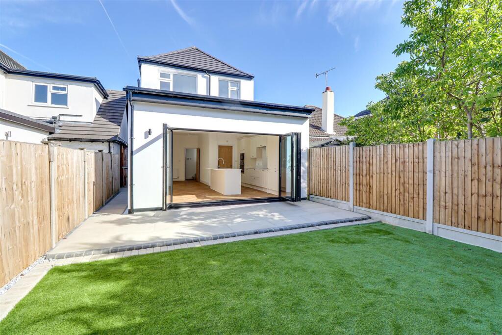 * WEST BACKING GARDEN WITH OUTBUILDING * Woodfield Park Drive, Leigh-on-Sea photo 4