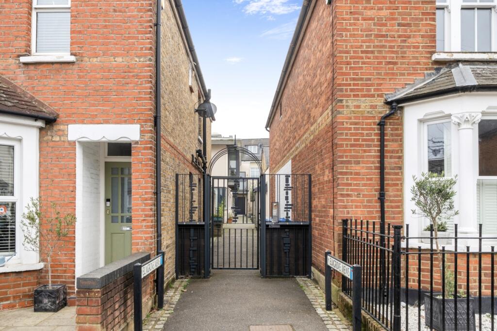 Main image of property: Elmgrove Mews Weybridge KT13