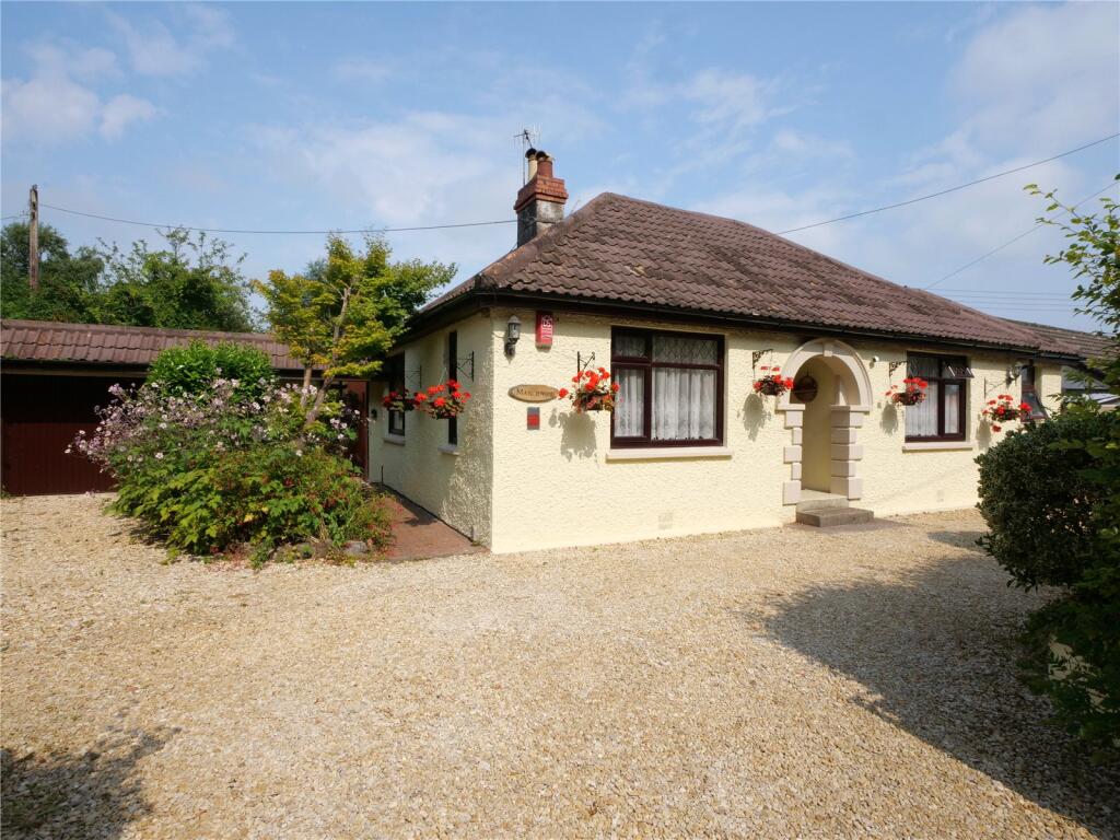 Main image of property: A spacious bungalow with large gardens and versatile living space.