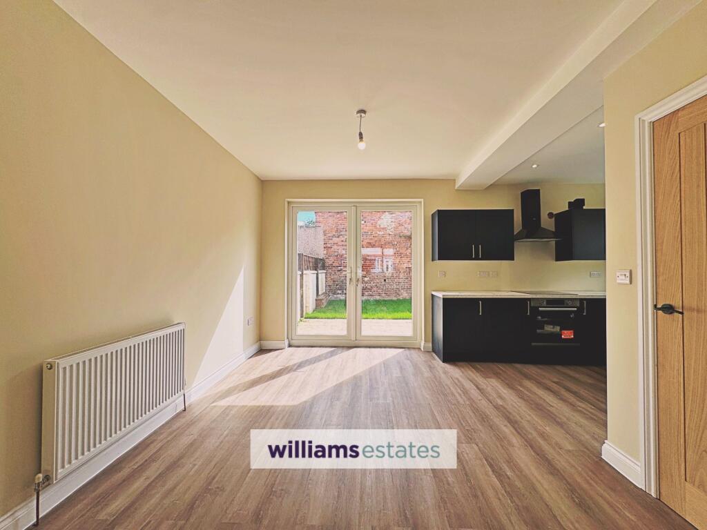 House in Rhyl - More