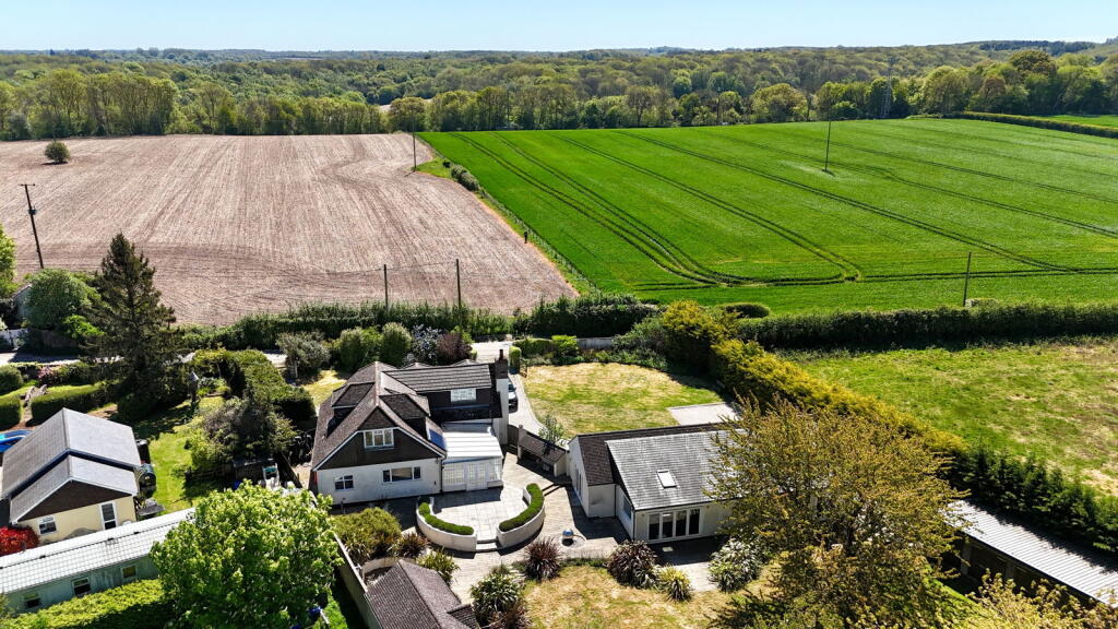 Main image of property: Beautiful Country Retreat, Versatile Outbuildings & An Approximate 2 Acre Plot!!