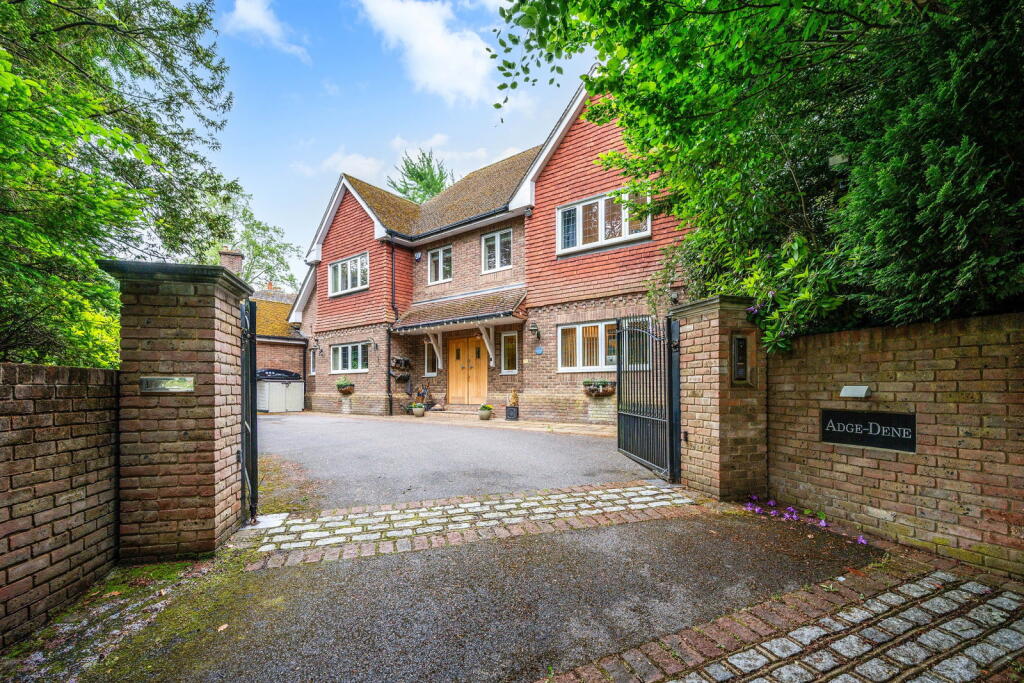 Main image of property: Woodhurst Lane, Oxted, RH8 9HL
