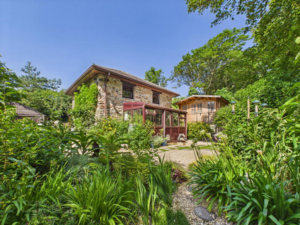 Main image of property: Perrancoombe Rd, TR6 - Magical North Coast Hideaway | 1 Bed Garden Cabin | Hot Tub Area | ¼ Acre Cottage Gardens
