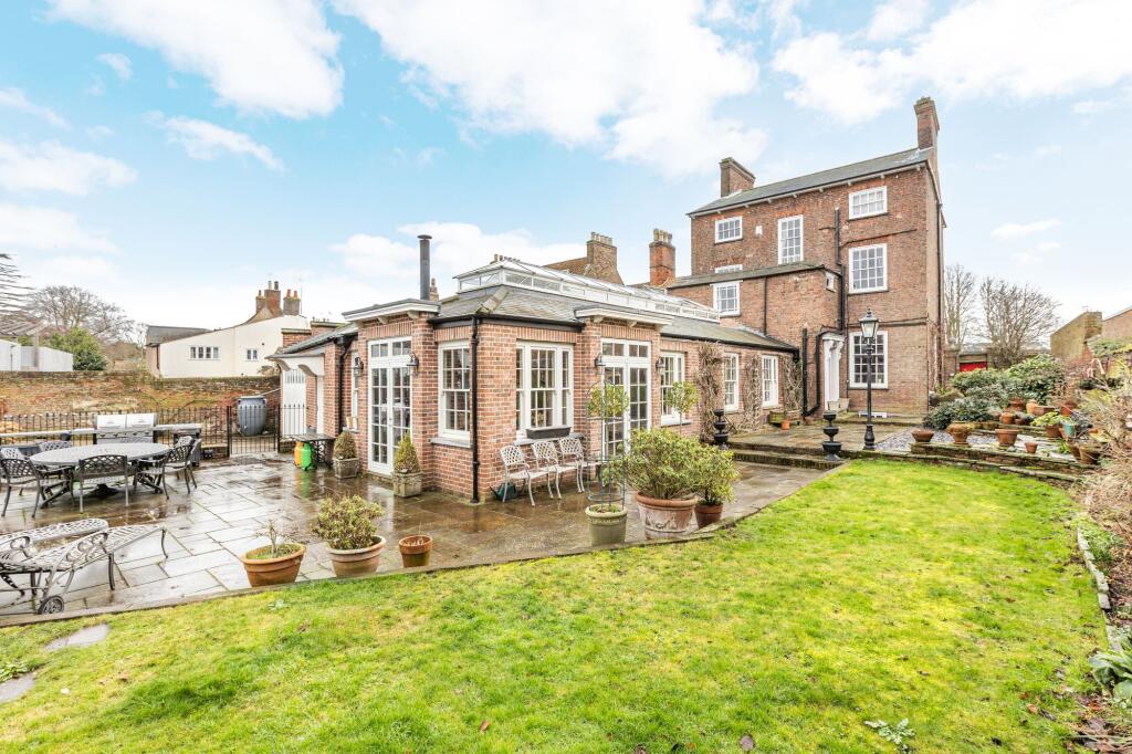Main image of property: Distinguished Grade II Listed Riverside Georgian Residence in Wisbech