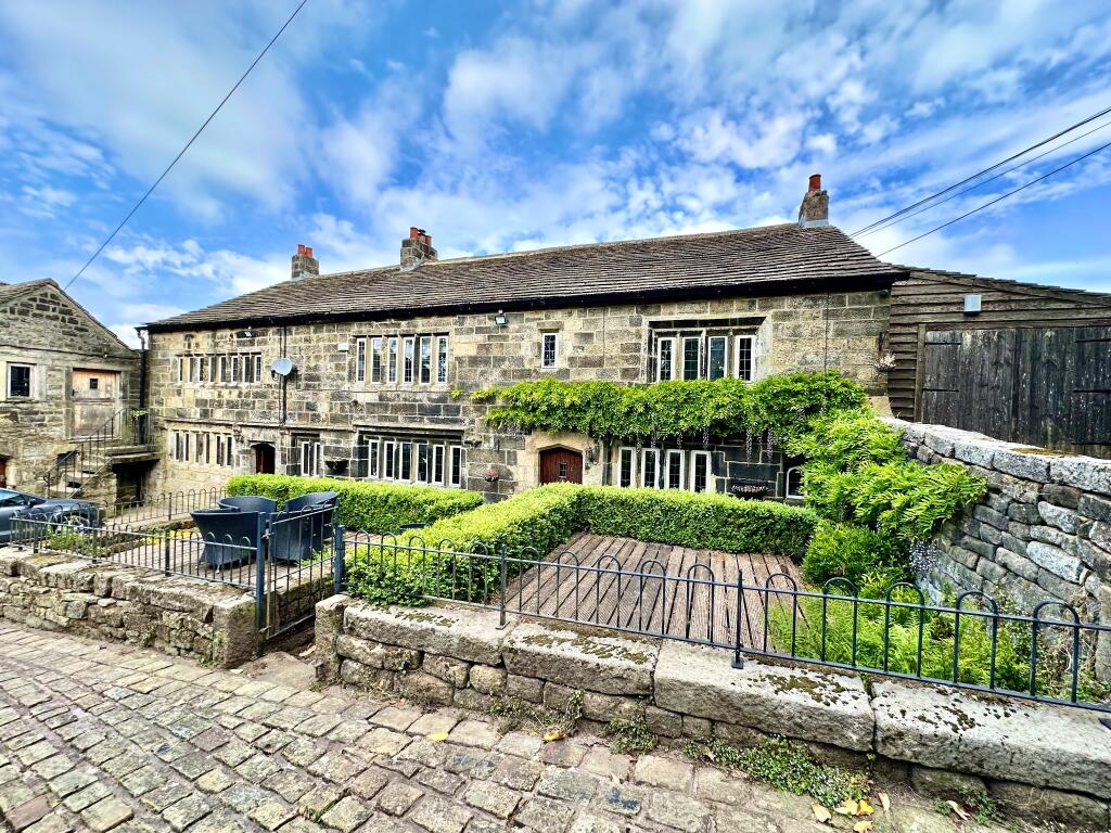 Main image of property: Wood Top Farm, Cragg Vale, Hebden Bridge, HX7 5TX