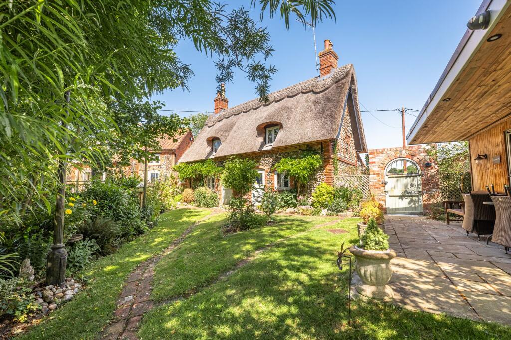 Main image of property: Characterful 5 Bedroom Thornage Home with Open-Plan Kitchen, Beautiful Grounds, and Versatile Studio