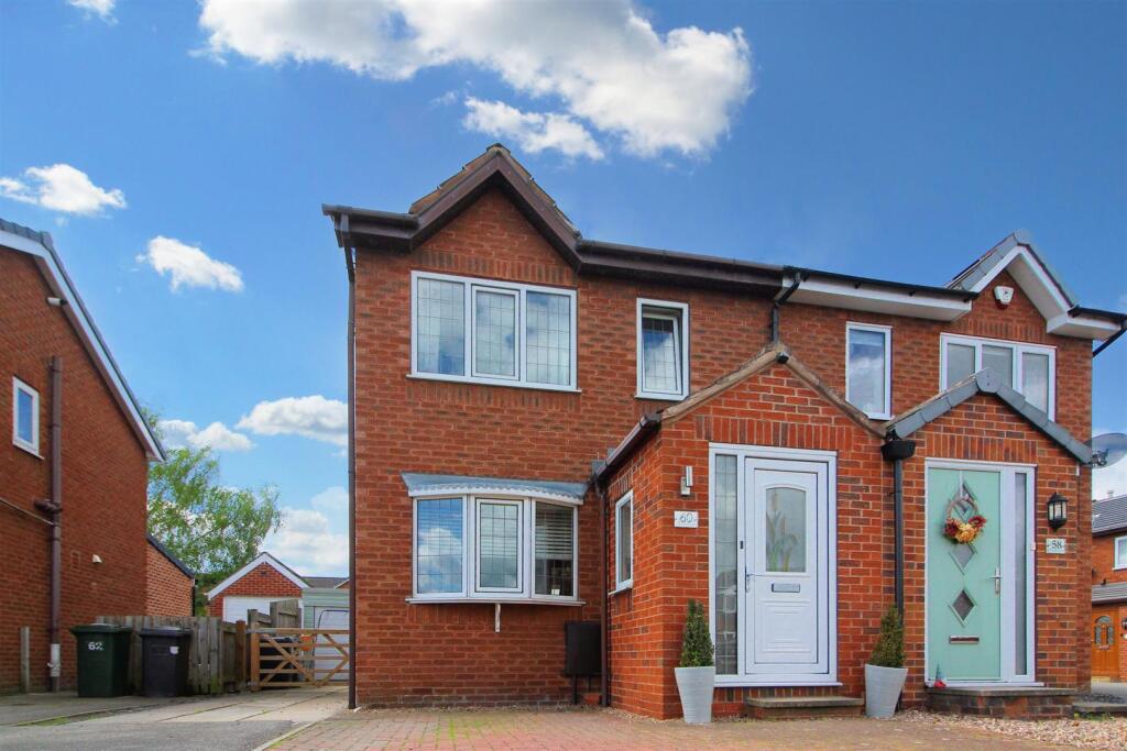 Main image of property: Woodlands Drive, Skelmanthorpe, Huddersfield HD8 9DB