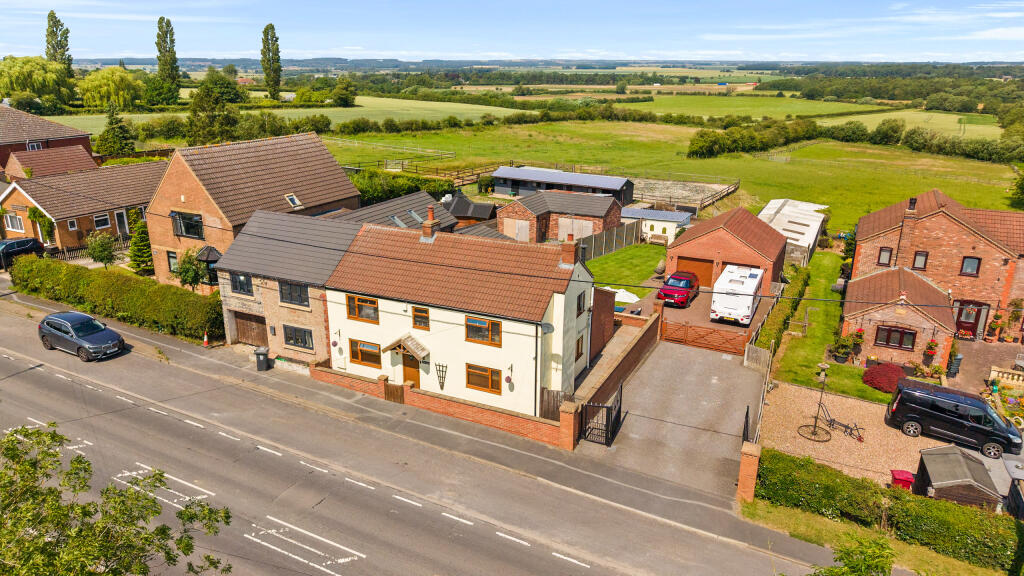 Main image of property: The Lilacs, Melton Road, Wrawby DN20 8SS