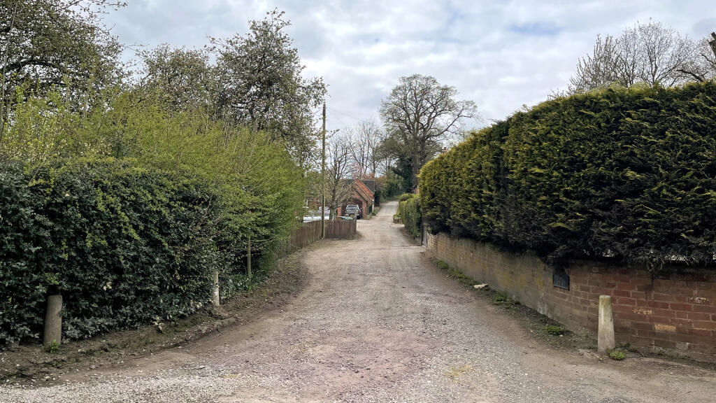 The land lies on Church Lane.