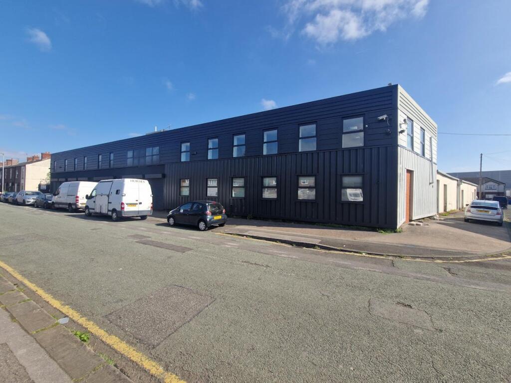 Main image of property: Meadow Industrial Park, Phoenix House, Taylor Lane, Manchester, M34 3NR