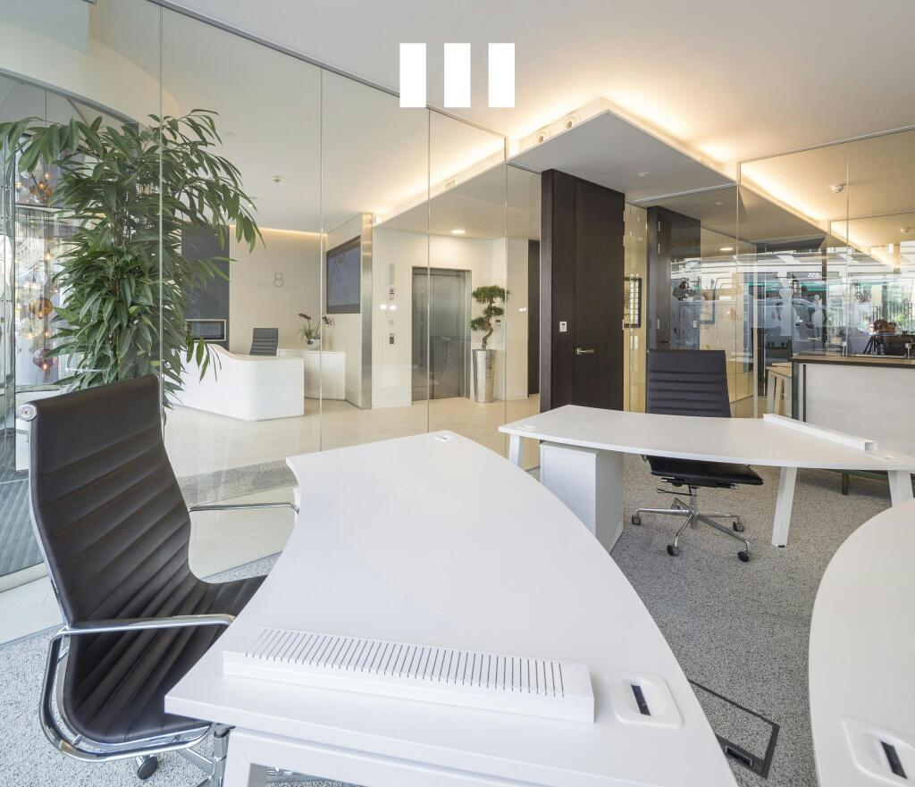 8 City Road Modern OpenPlan Office With Glass Walls And Sleek Furniture.jpg