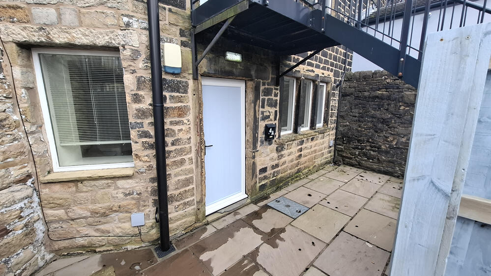 Main image of property: 4a Smithy Yard Uppermill OL3 6AQ