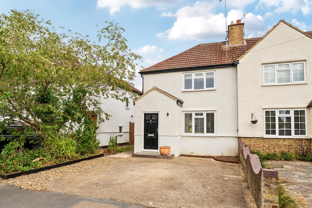 Main image of property: Coverts Road, Esher, KT10
