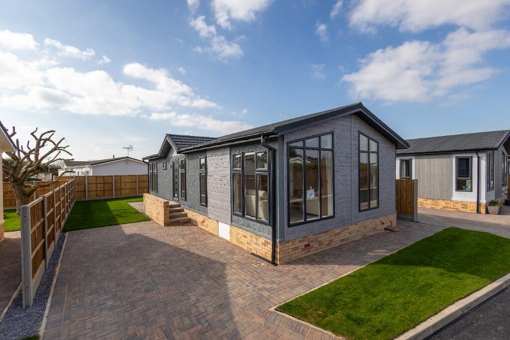 Main image of property: **PART EXCHANGE AVAILABLE, COUNCIL TAX BAND A, LOW RUNNING COST & SITE FEES** Waterbeach Court, Denny End Road, CB25