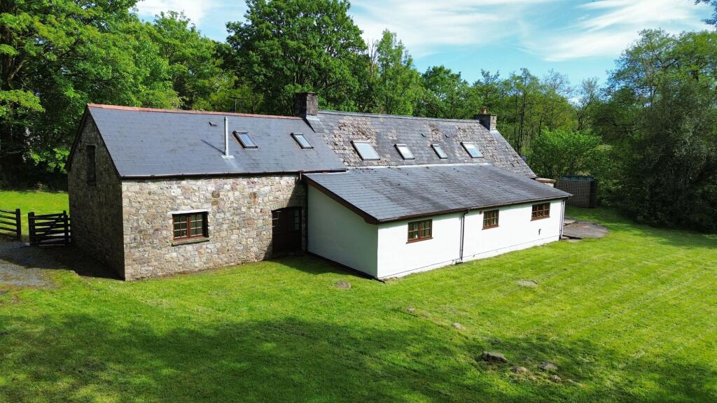 House in Swansea - More