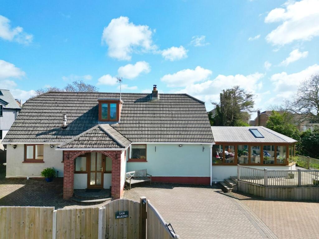 Main image of property: Set In A Generous Non Estate Plot Approaching Quarter Of An Acre.