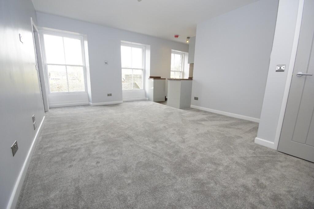 Main image of property: Flat at High St West, Glossop, SK13 8AZ **MODERN!**