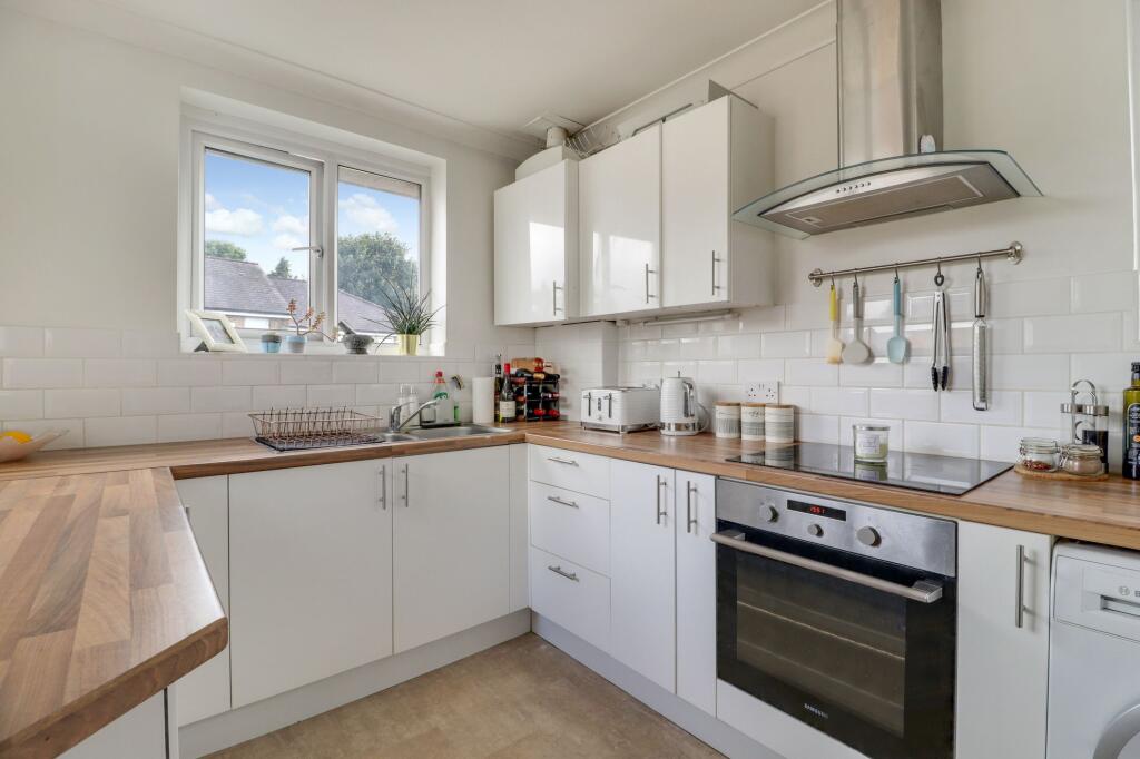 Main image of property: Wolsey Grove, Esher, KT10
